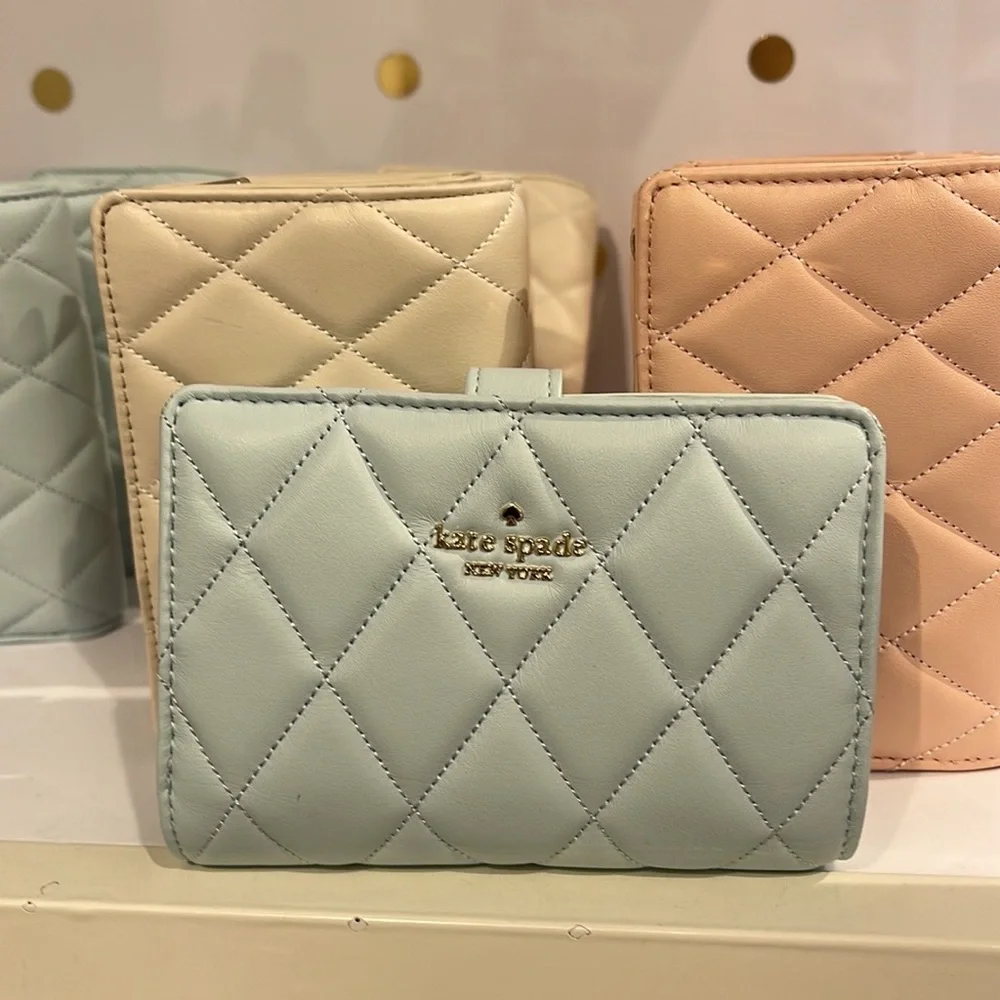 Kate Spade Carey Medium Compartment Bifold Wallet 
COLOR: Turquoise - Picture 16 of 16